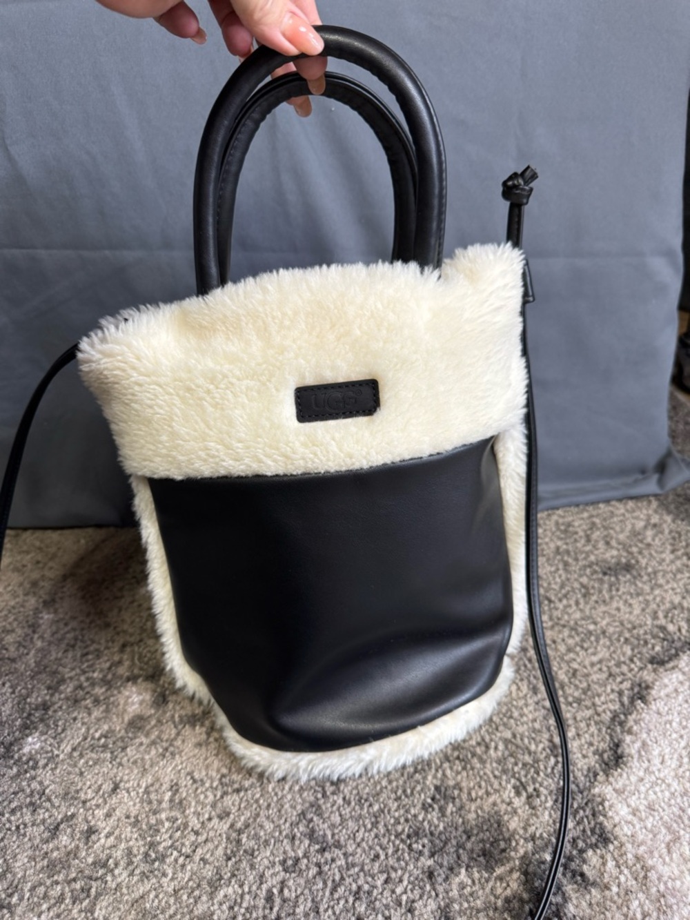 UGG Black and Cream Faux Shearling Shoulder Bucket Bag